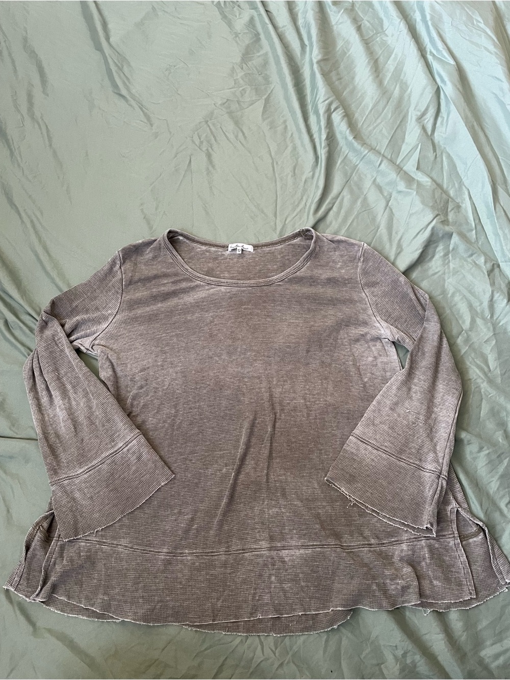 Toned down green flared sleeve long sleeve top